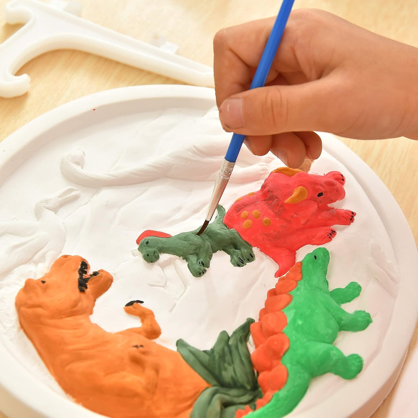 Plaster medallion to paint - Dinosaur